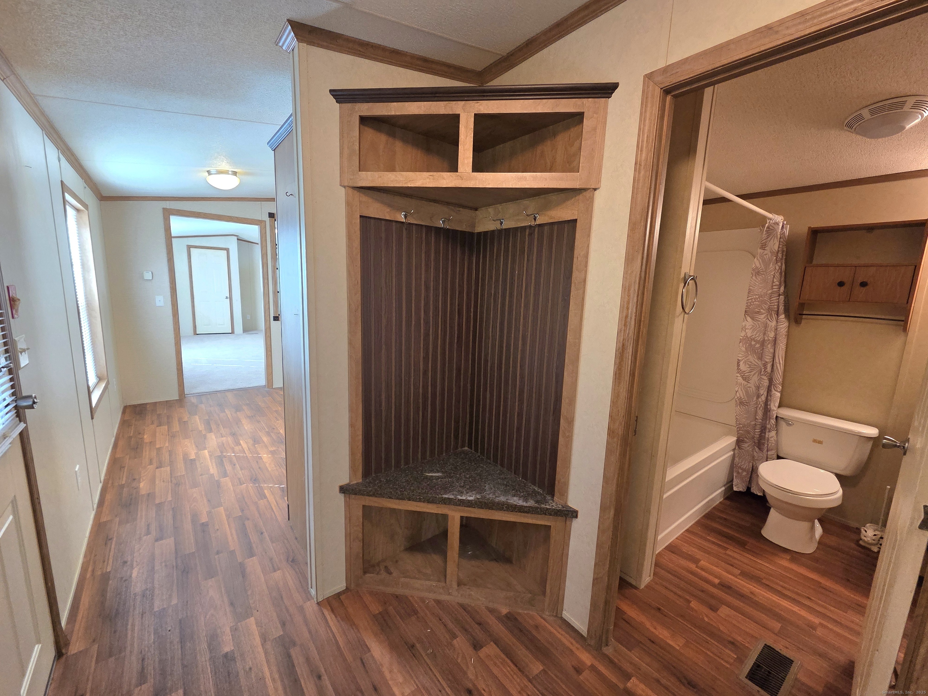 9 N Road, Unit 17 East Windsor, CT 06088 - Photo 17 of 24 a bathroom with a sink and a mirror