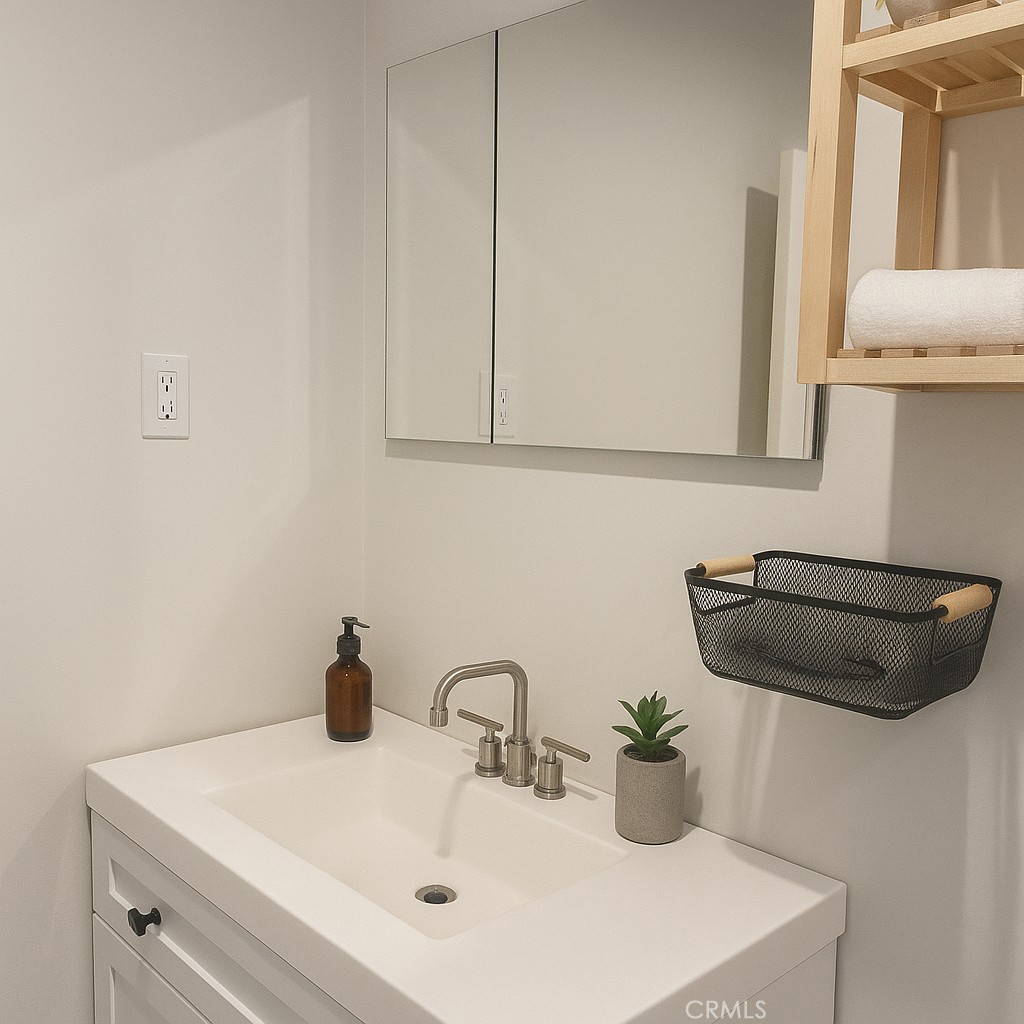 6675 Mission Gorge Road, Unit A114 San Diego, CA 92120 - Photo 13 of 26 a bathroom with a sink and a mirror