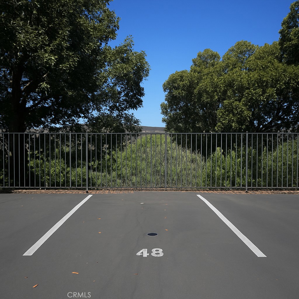 6675 Mission Gorge Road, Unit A114 San Diego, CA 92120 - Photo 18 of 26 a view of a street with a houses