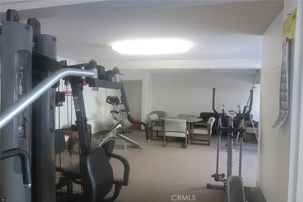 6675 Mission Gorge Road, Unit A114 San Diego, CA 92120 - Photo 24 of 26 a view of a room with gym equipment