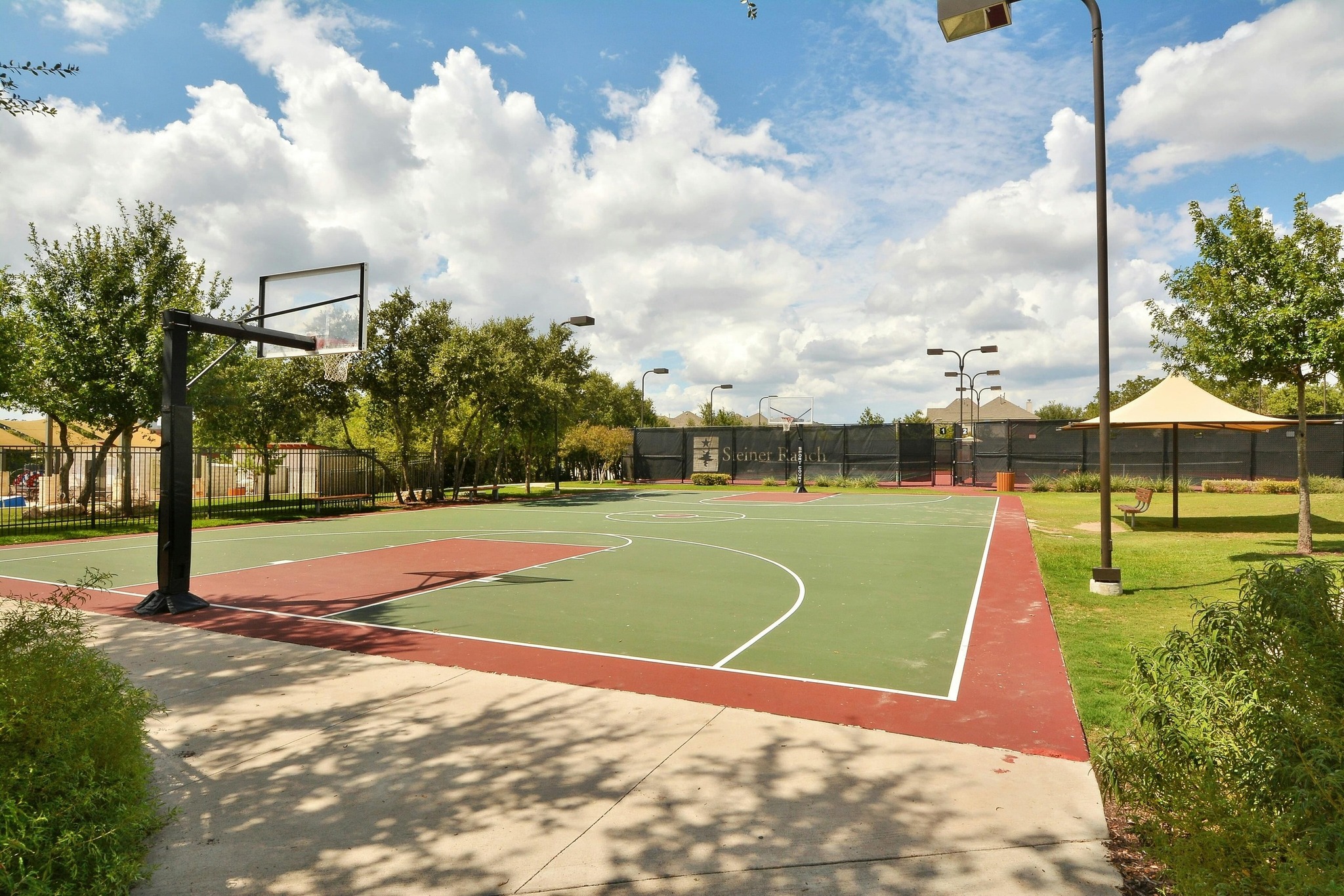 12308 Simmental Drive, Unit 94 Austin, TX 78732 - Photo 34 of 37 a view of a basketball court
