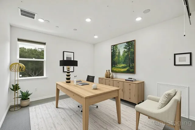 a room with furniture wooden floor and window