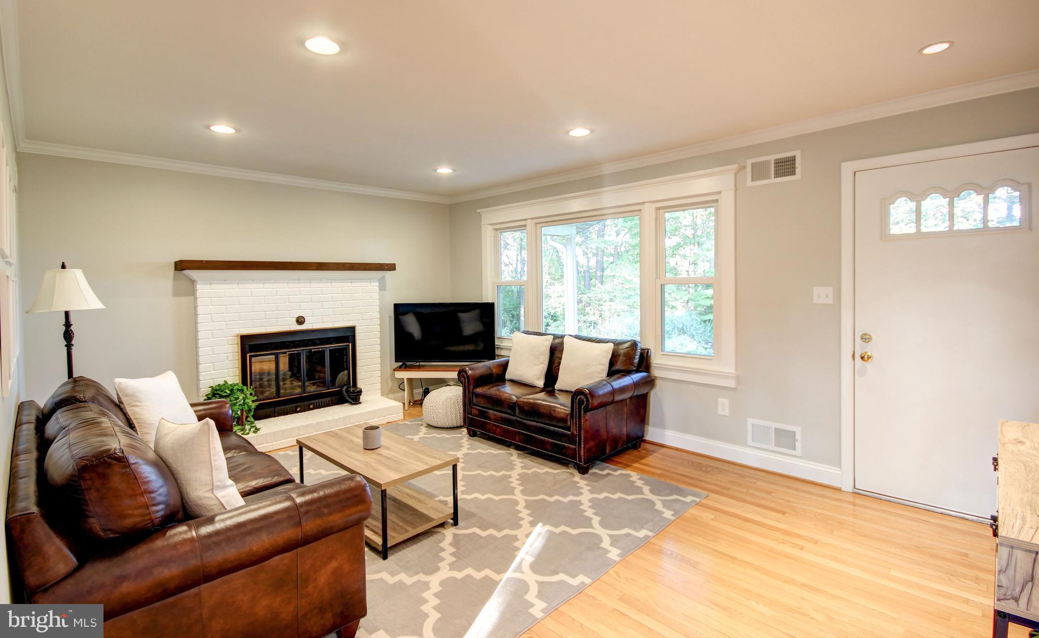 4934 Fleming Road Mount Airy, MD 21771 - Photo 3 of 42 Living Room w/brick fireplace & hardwood