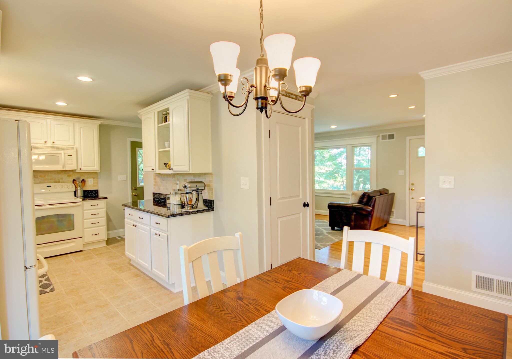 4934 Fleming Road Mount Airy, MD 21771 - Photo 8 of 42 Dining room into kitchen and living room