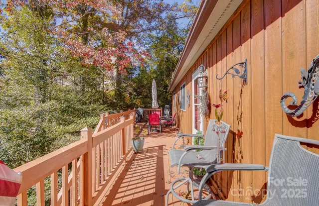 a view of balcony with furniture