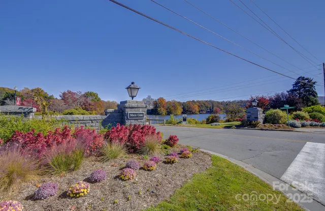 a view of swimming pool with a yard