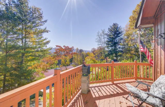a view of a street with wooden fence and floor
