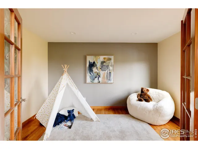 a workspace with furniture and a window