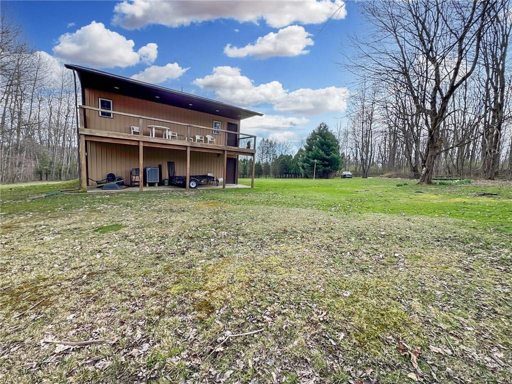 22441 Rockdale Road Cambridge Springs, PA 16403 - Photo 18 of 22 a front view of a house with a yard