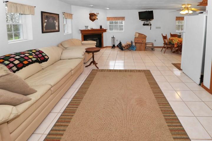 22441 Rockdale Road Cambridge Springs, PA 16403 - Photo 7 of 22 a living room with furniture and a couch