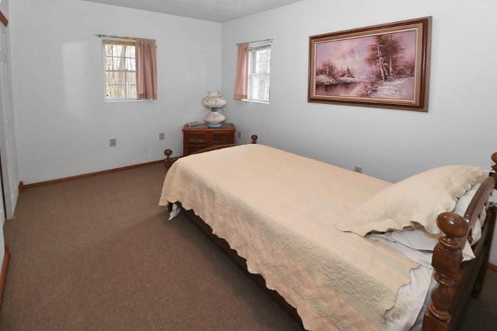 22441 Rockdale Road Cambridge Springs, PA 16403 - Photo 10 of 22 a bedroom with bed and window