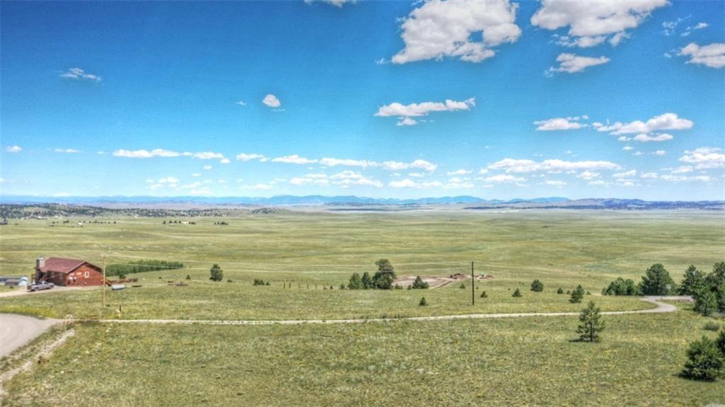 7209 Ranch Road Hartsel, CO 80449 - Photo 3 of 27 a view of an ocean and a mountain