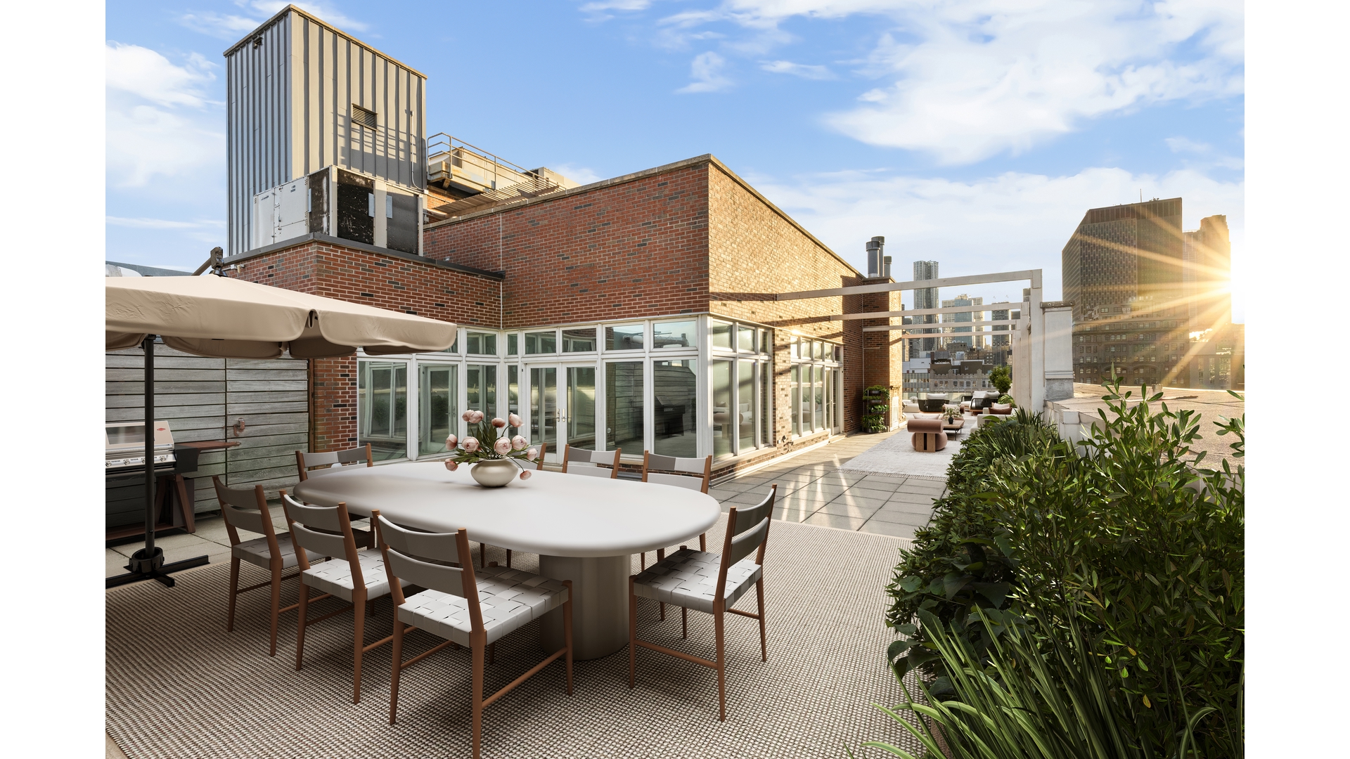 129 Lafayette Street, Unit PHA Manhattan, NY 10013 - Photo 13 of 26 a view of a patio with table and chairs and potted plants
