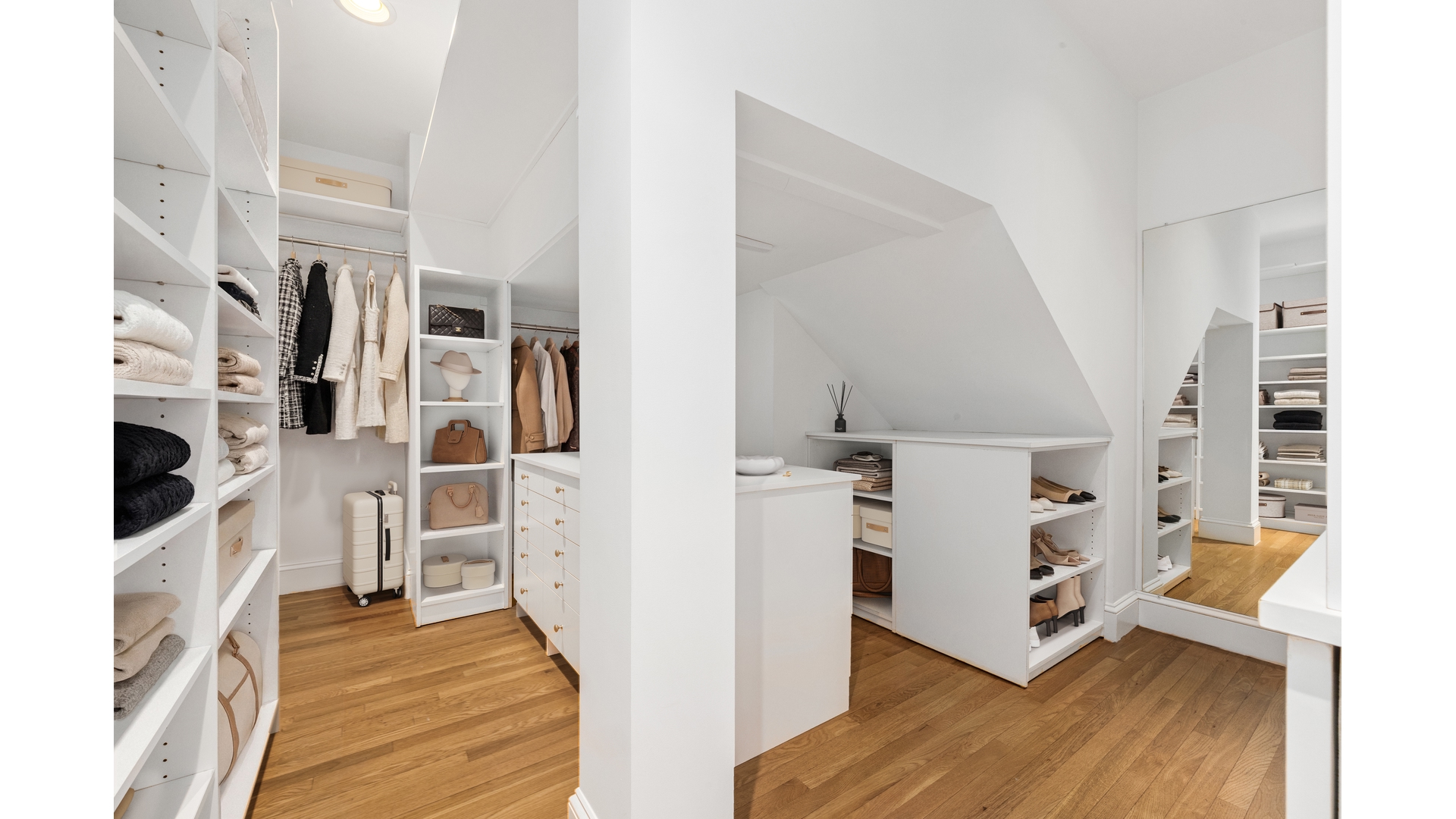 129 Lafayette Street, Unit PHA Manhattan, NY 10013 - Photo 22 of 26 a view of a living room with furniture and wooden floor