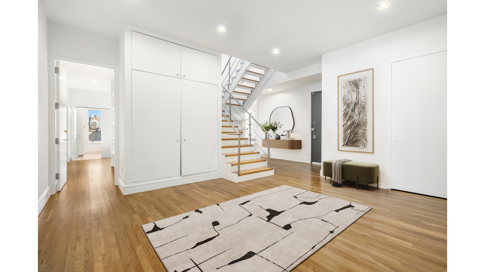129 Lafayette Street, Unit PHA Manhattan, NY 10013 - Photo 25 of 26 a living room with a bath tub and a wooden floor