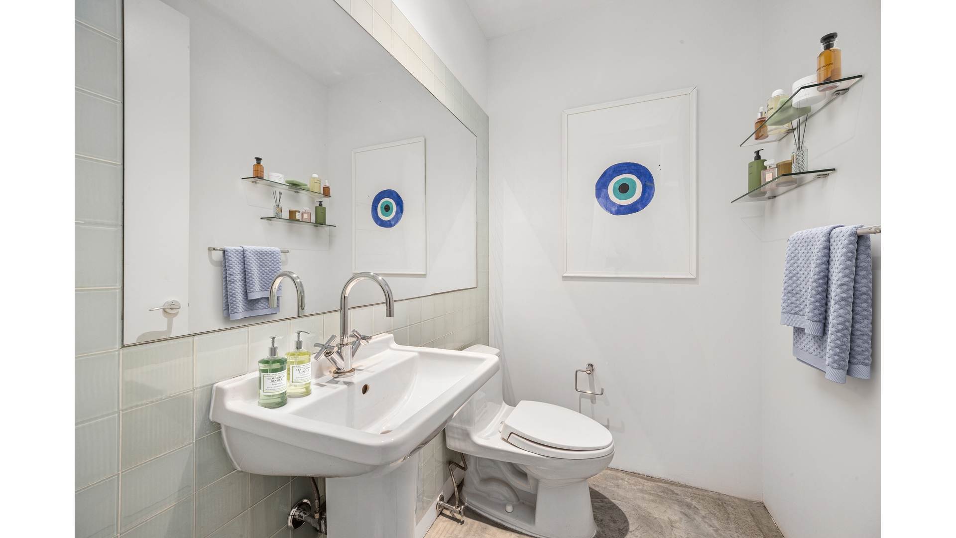 129 Lafayette Street, Unit PHA Manhattan, NY 10013 - Photo 26 of 26 a bathroom with a sink toilet and a mirror