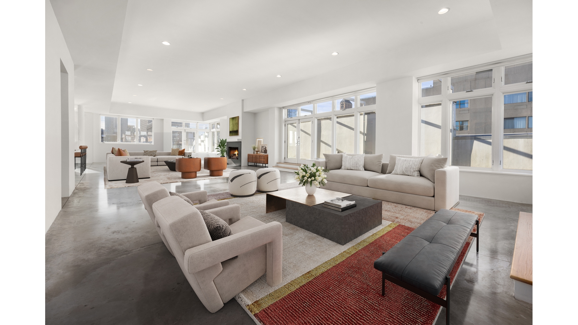 129 Lafayette Street, Unit PHA Manhattan, NY 10013 - Photo 3 of 26 a living room with furniture and a large window