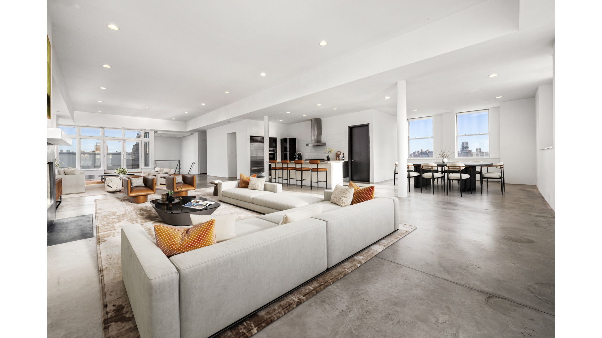 129 Lafayette Street, Unit PHA Manhattan, NY 10013 - Photo 5 of 26 a living room with furniture and a large window