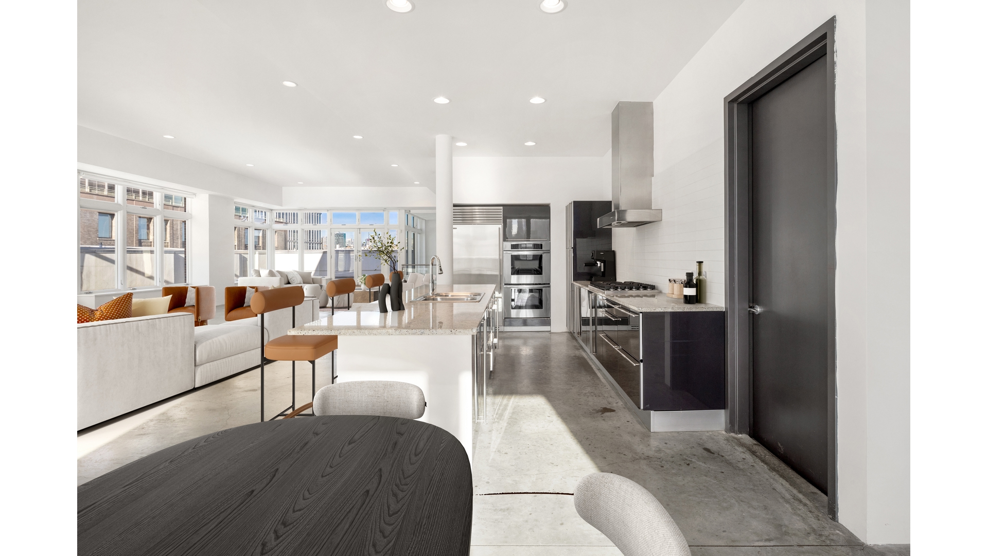 129 Lafayette Street, Unit PHA Manhattan, NY 10013 - Photo 9 of 26 a living room with stainless steel appliances furniture a rug and a view of kitchen