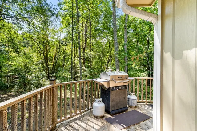 a view of a balcony with chairs