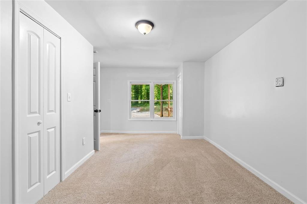 2984 East Paulding Drive Dallas, GA 30157 - Photo 13 of 35 a view of a room with a window