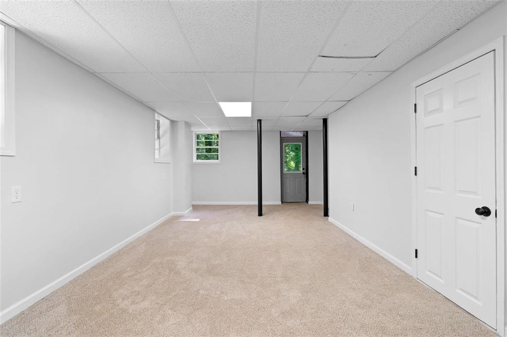 2984 East Paulding Drive Dallas, GA 30157 - Photo 14 of 35 an empty room with windows