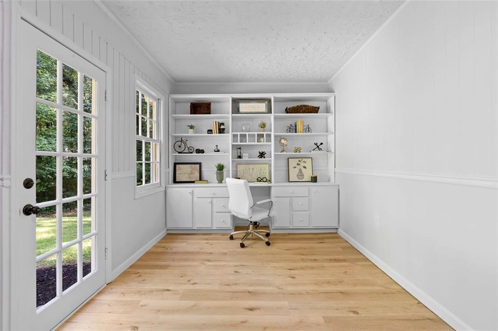 2984 East Paulding Drive Dallas, GA 30157 - Photo 23 of 35 a view of empty room with windows and wooden floor