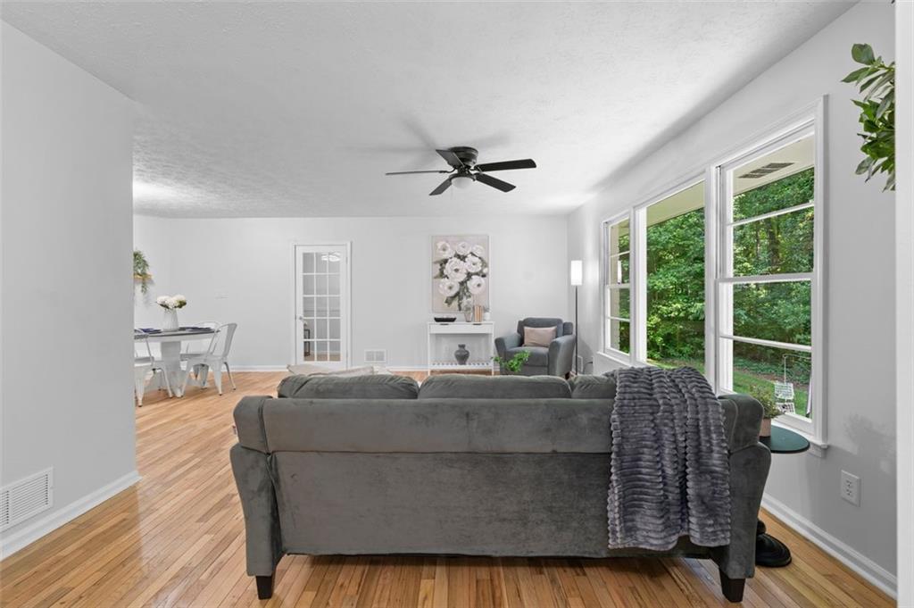 2984 East Paulding Drive Dallas, GA 30157 - Photo 30 of 35 a living room with furniture and a large window