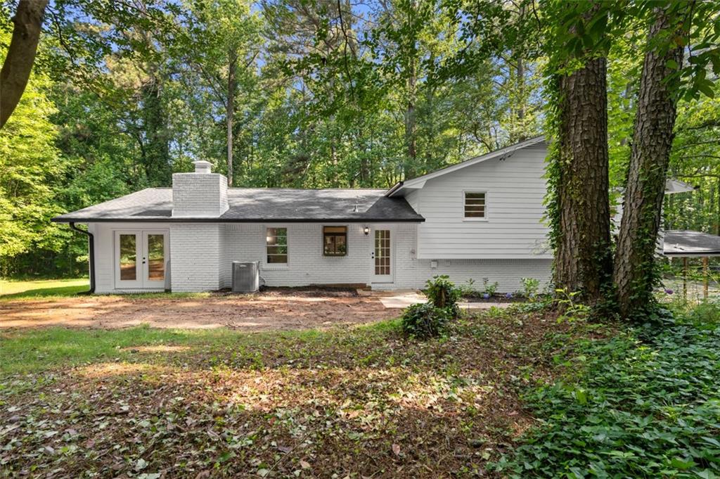 2984 East Paulding Drive Dallas, GA 30157 - Photo 32 of 35 a front view of a house with a garden