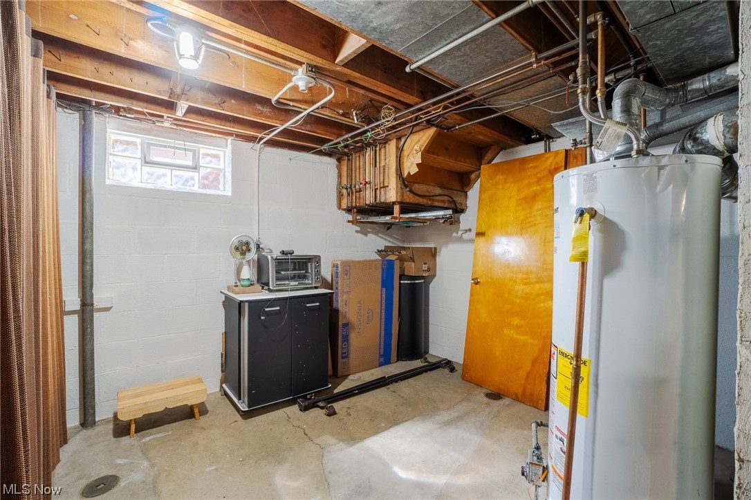 15022 Triskett Road Cleveland, OH 44111 - Photo 25 of 35 Basement with water heater
