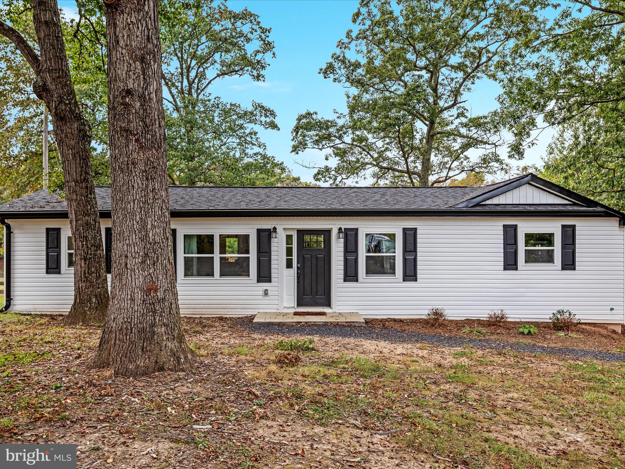 790 McDonald Road Winchester, VA 22602 - Photo 23 of 36 a house that has a tree in front of the house