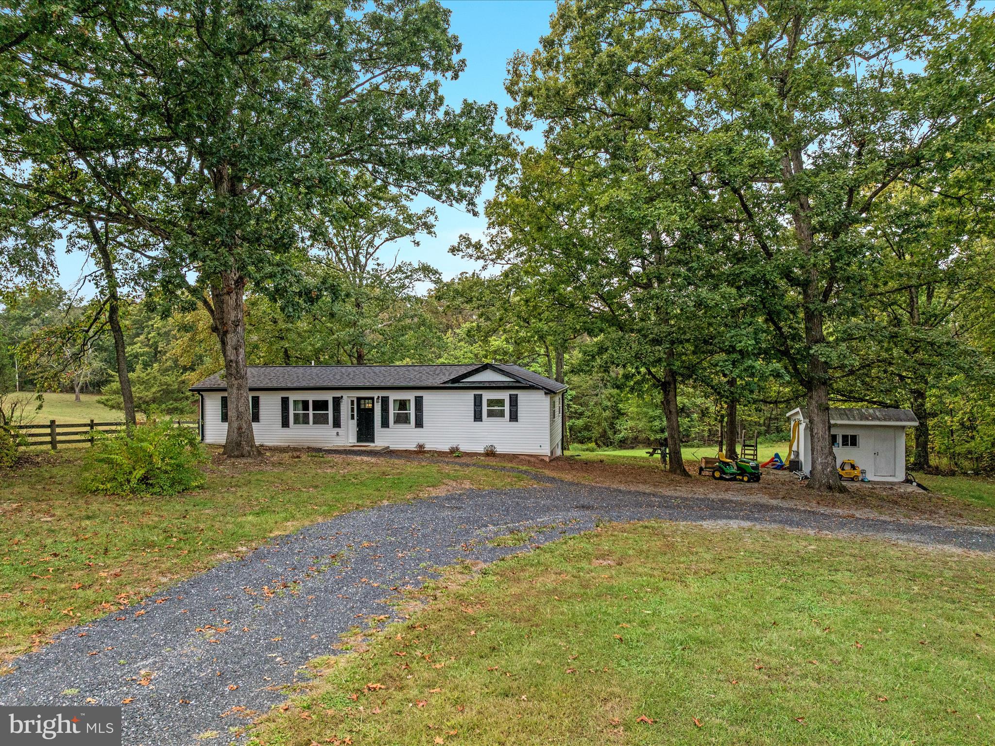 790 McDonald Road Winchester, VA 22602 - Photo 24 of 36 a front view of a house with a garden