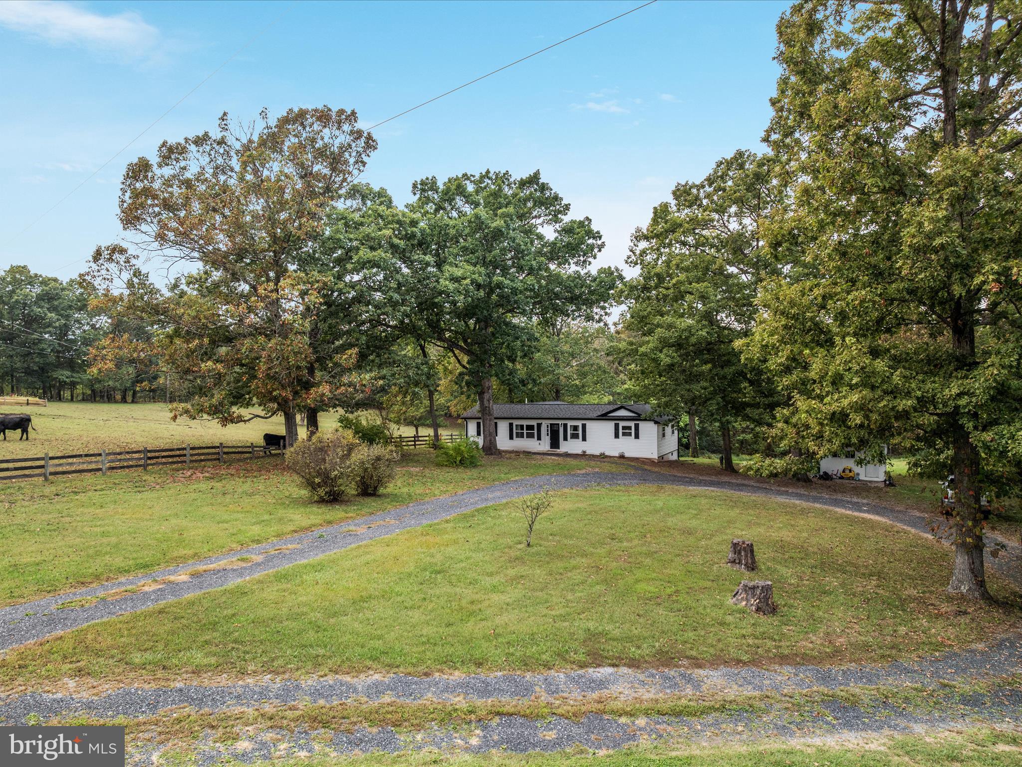 790 McDonald Road Winchester, VA 22602 - Photo 30 of 36 a view of a swimming pool with an outdoor space and seating area