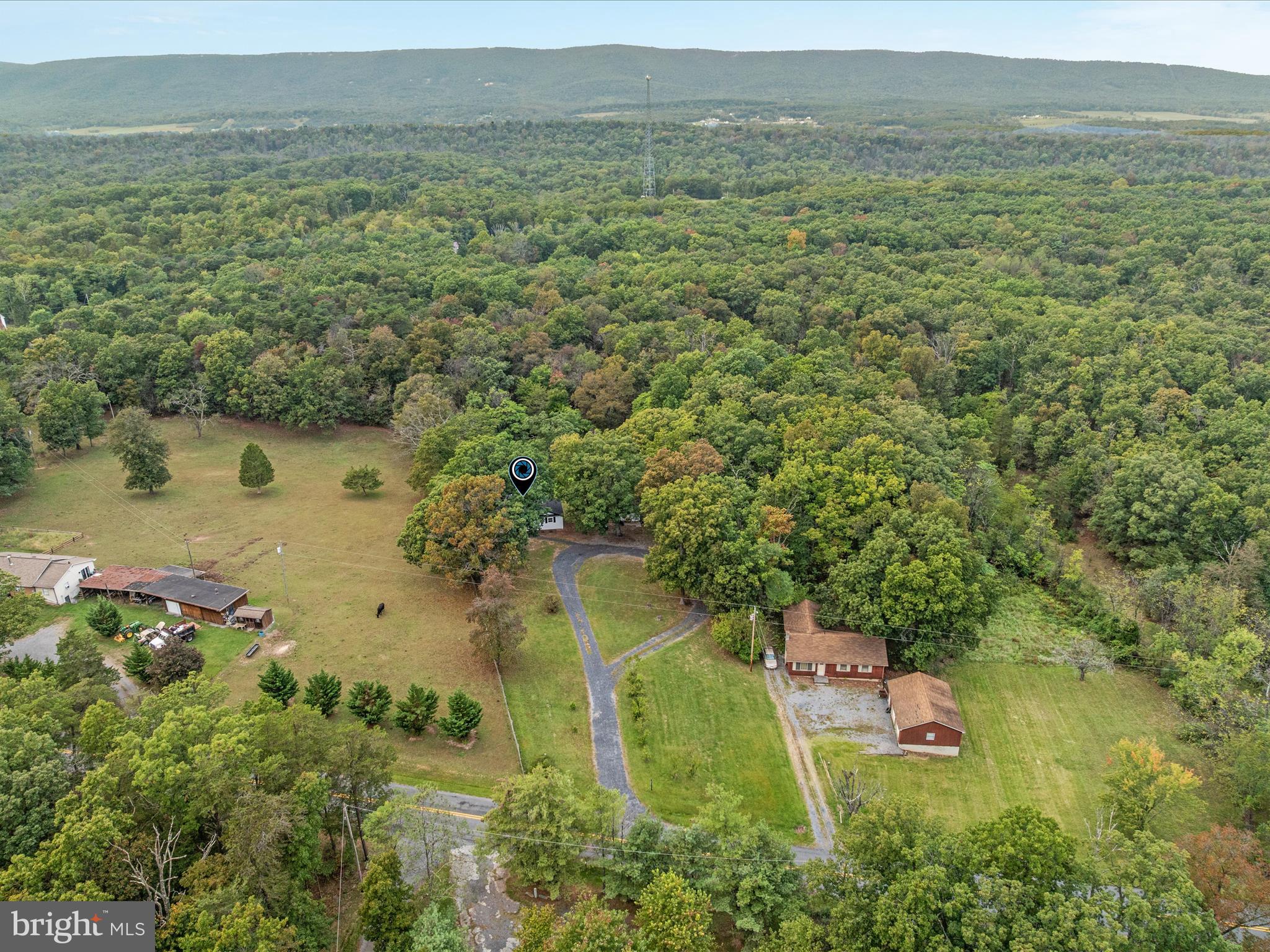 790 McDonald Road Winchester, VA 22602 - Photo 32 of 36 a view of a lake with a yard