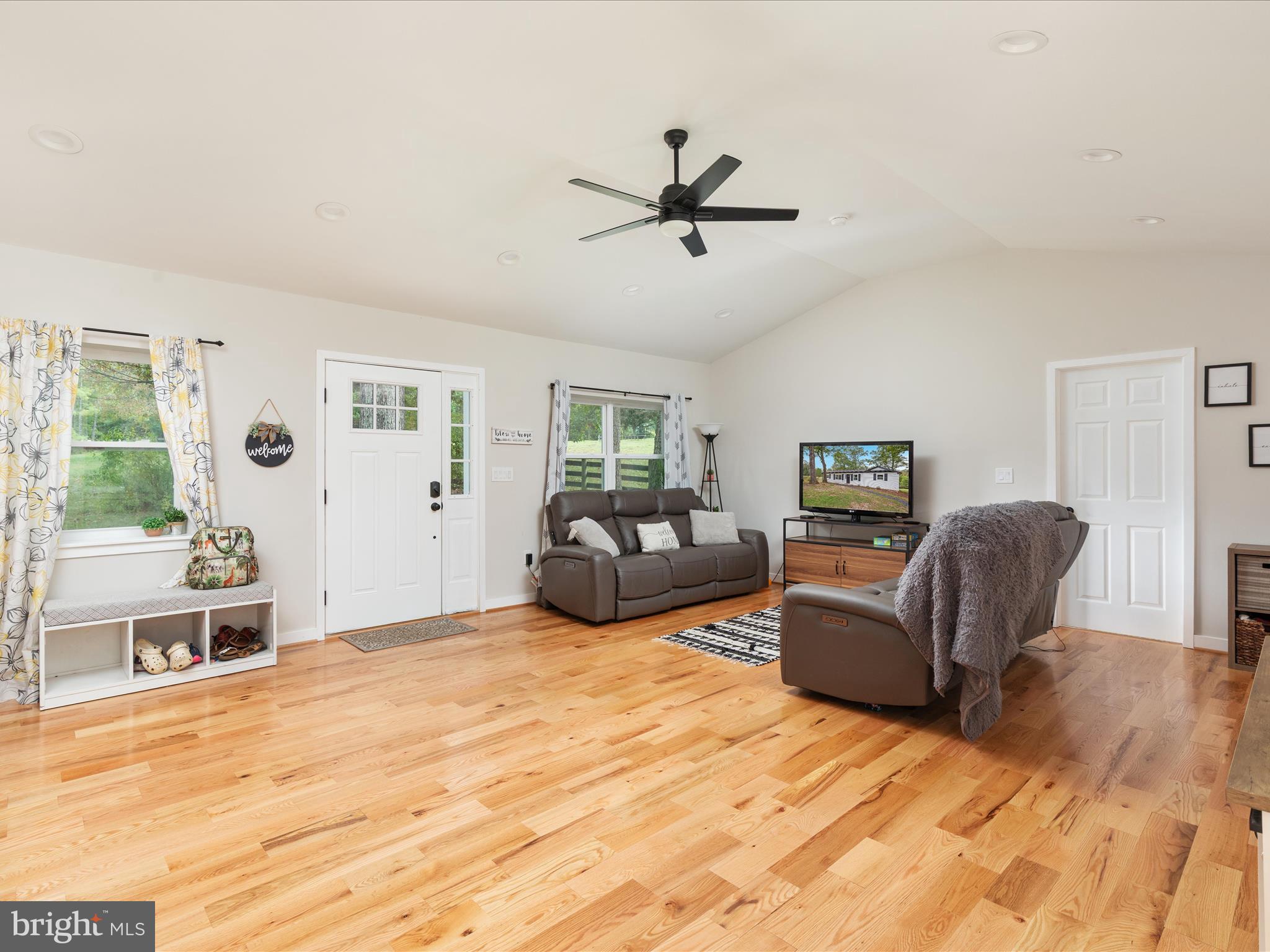 790 McDonald Road Winchester, VA 22602 - Photo 9 of 36 a bedroom with furniture and a wooden floor