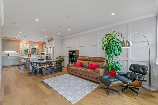 a view of a dining room with furniture and window