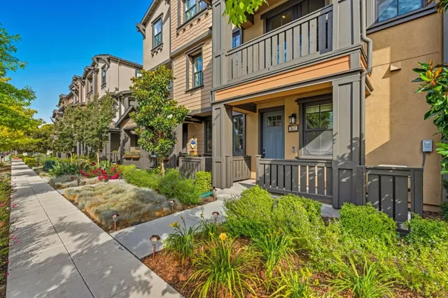 a view of a chair and table in the patio