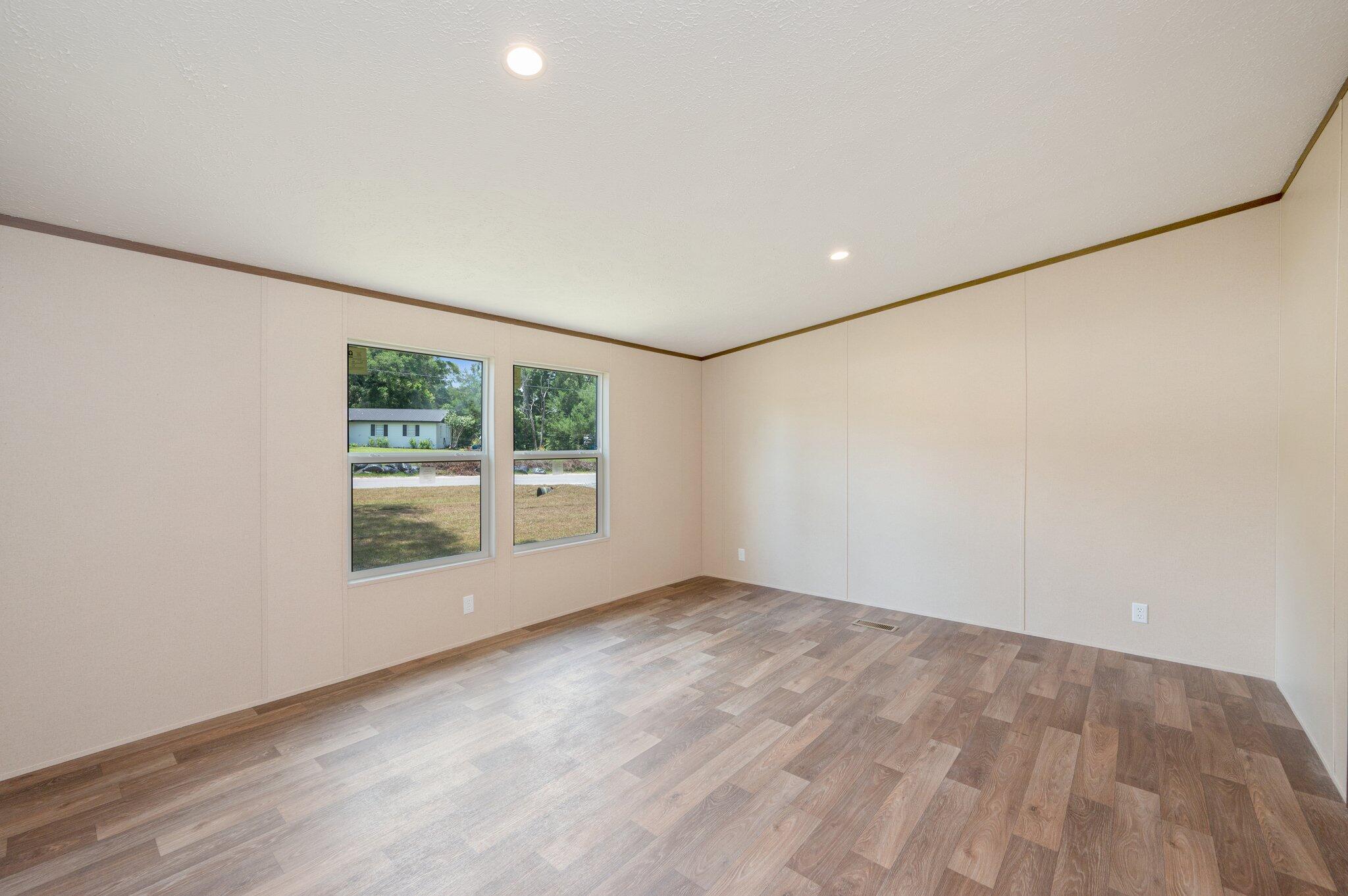 5227 Richardson Road Crestview, FL 32539 - Photo 18 of 44 an empty room with a window