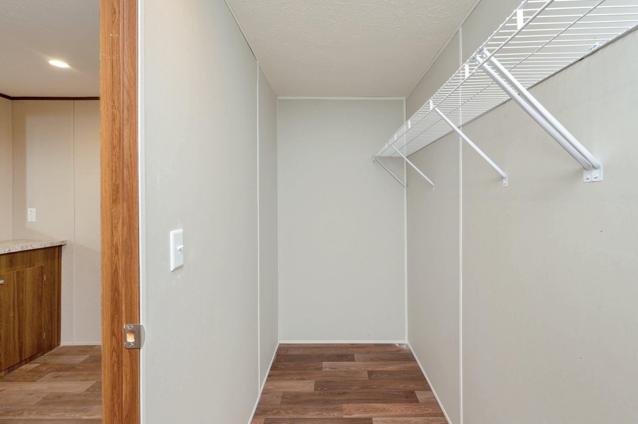 5227 Richardson Road Crestview, FL 32539 - Photo 23 of 44 a view of a hallway with white walls