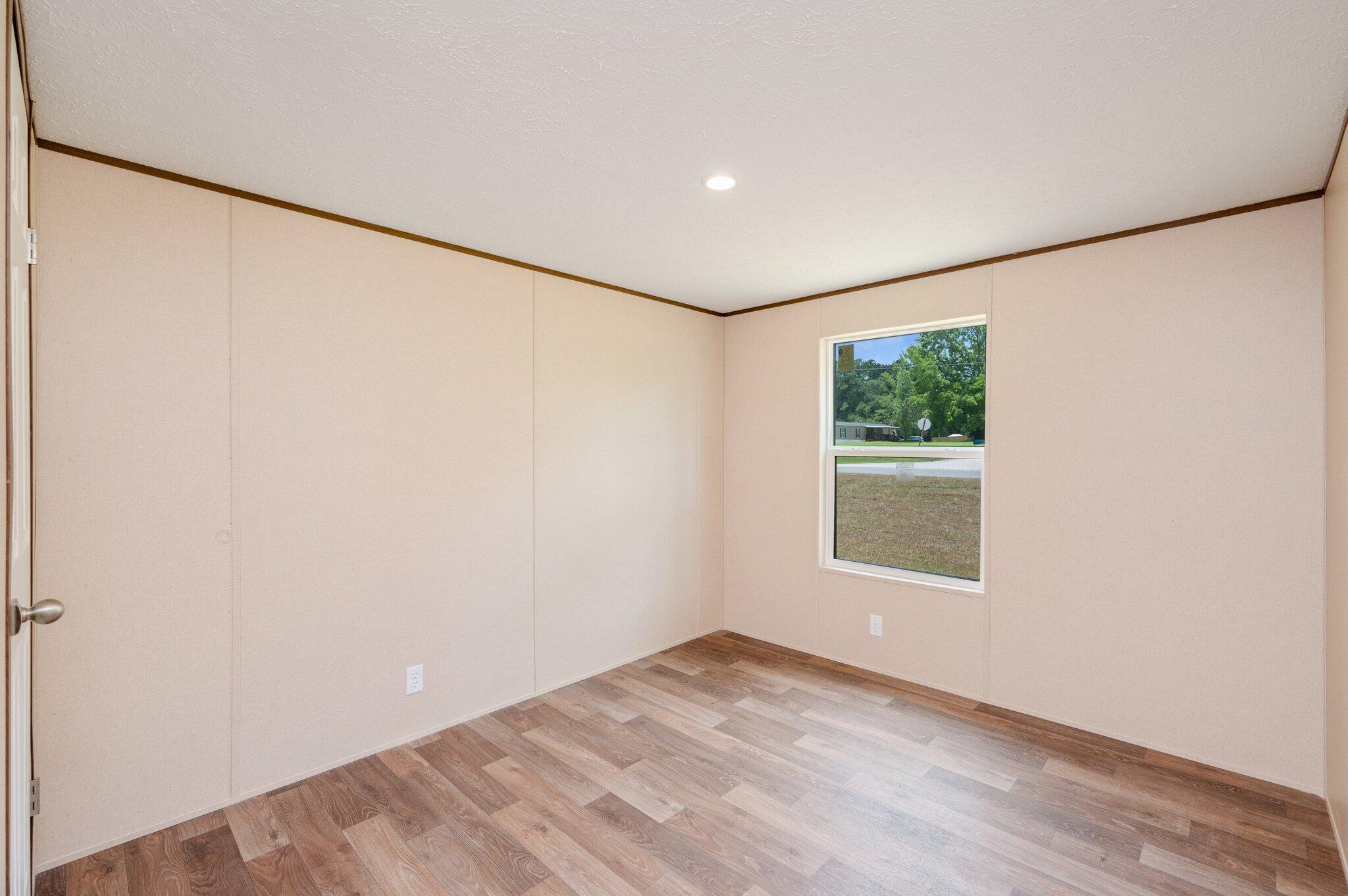 5227 Richardson Road Crestview, FL 32539 - Photo 25 of 44 an empty room with a window