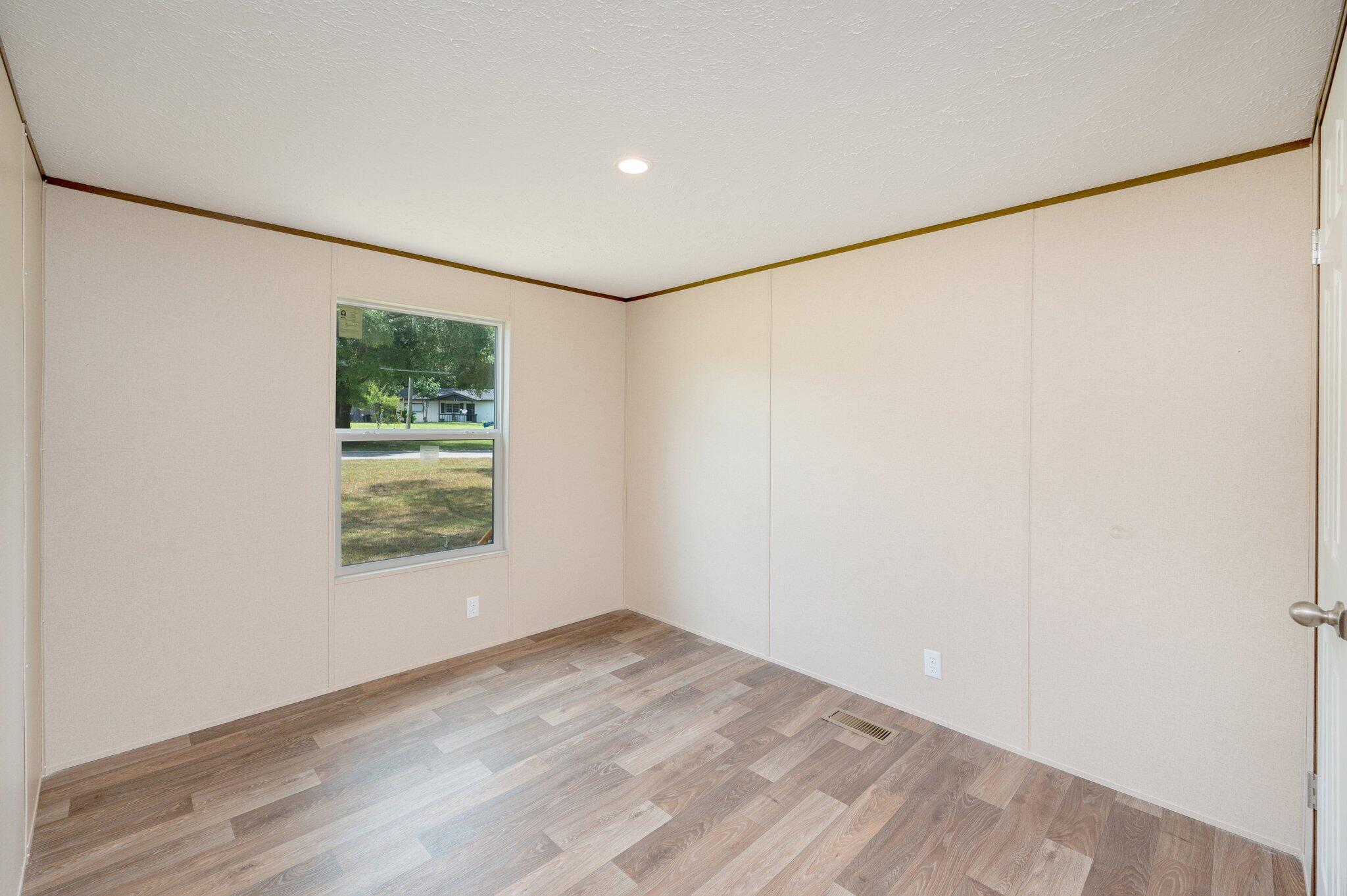 5227 Richardson Road Crestview, FL 32539 - Photo 27 of 44 an empty room with a window