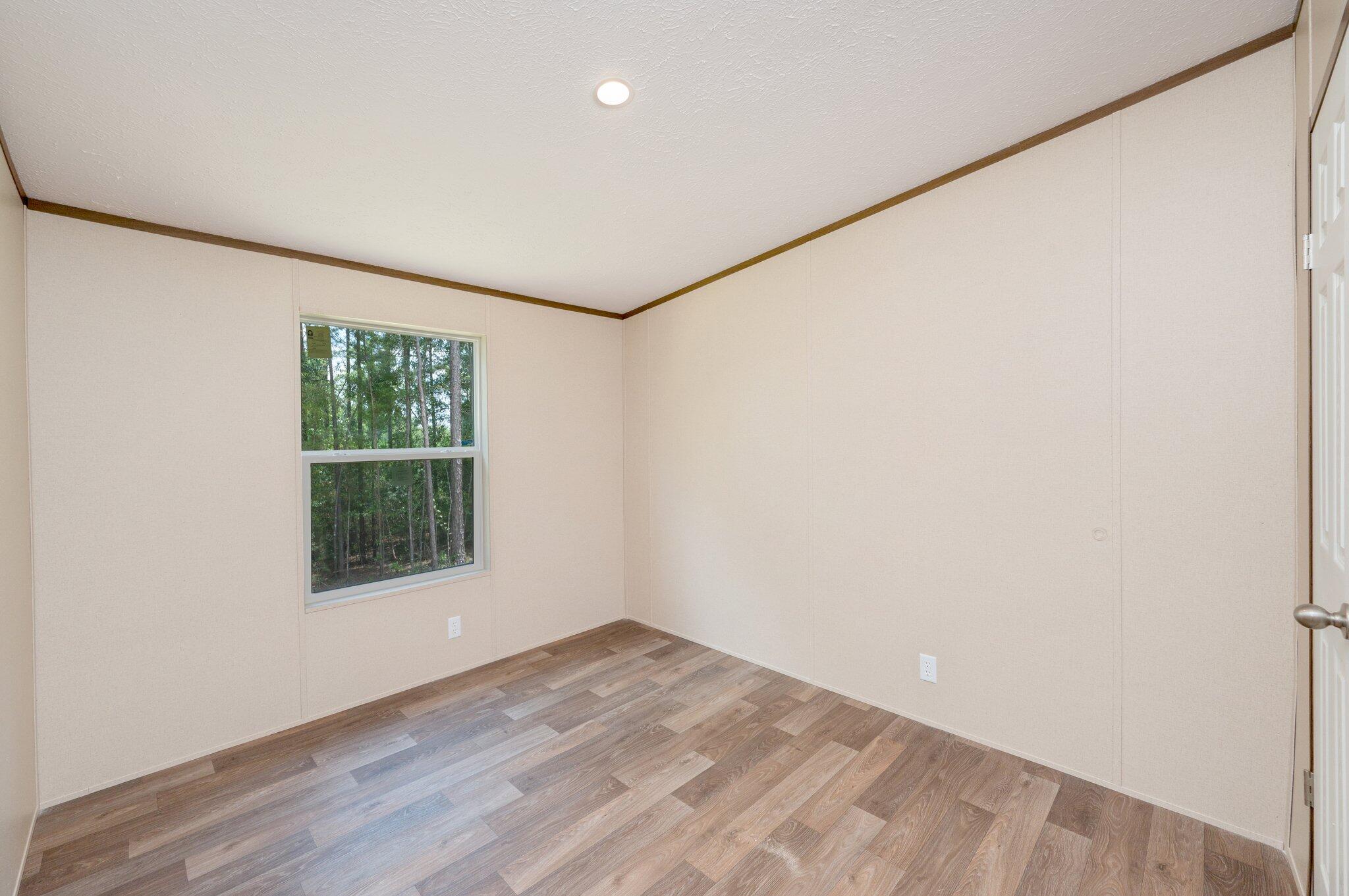 5227 Richardson Road Crestview, FL 32539 - Photo 33 of 44 an empty room with a window