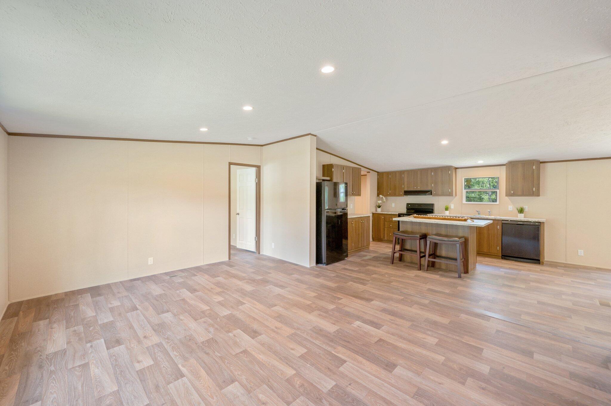 5227 Richardson Road Crestview, FL 32539 - Photo 7 of 44 a view of a kitchen with furniture and a window