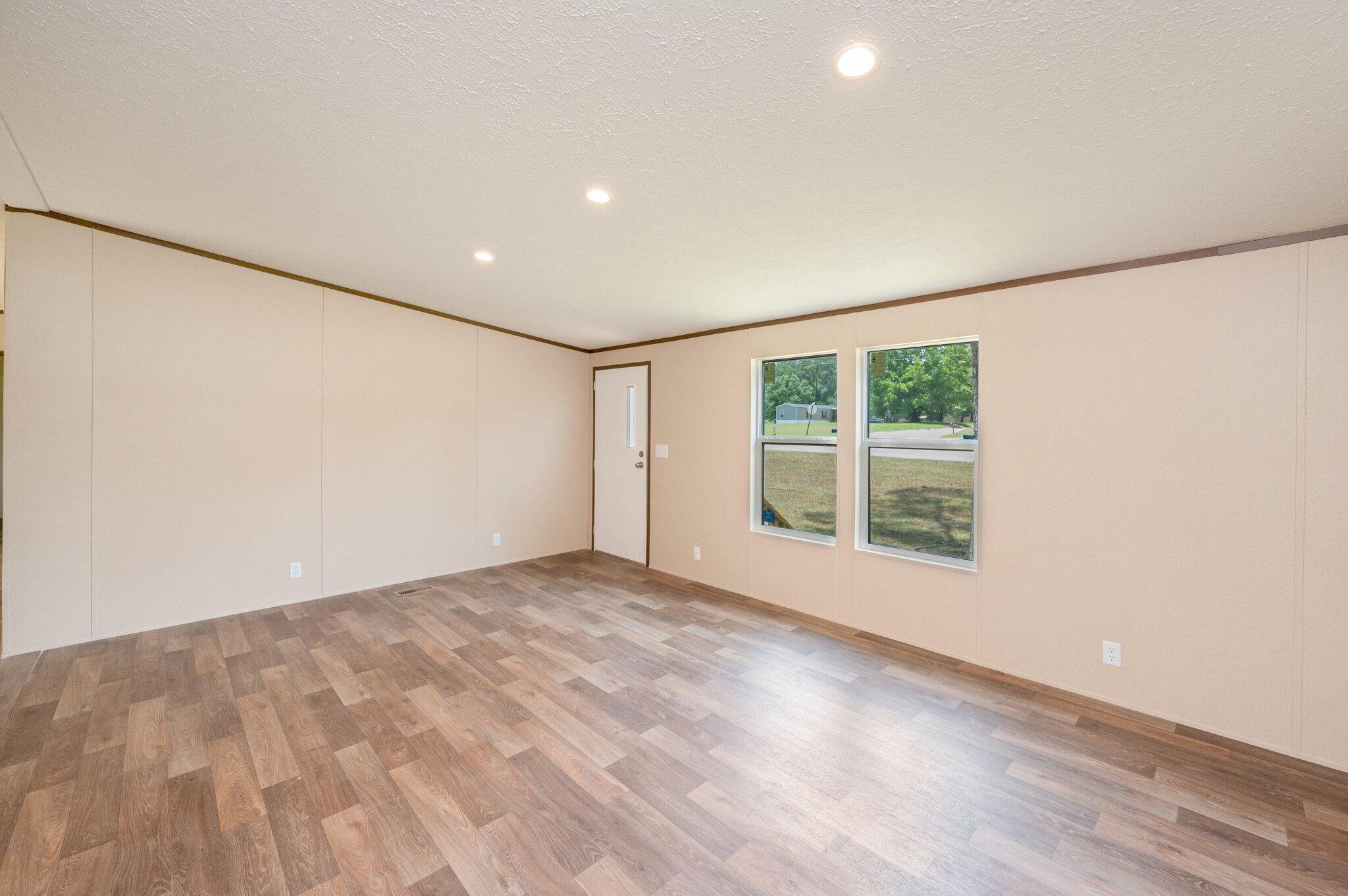 5227 Richardson Road Crestview, FL 32539 - Photo 9 of 44 a view of an empty room with a window
