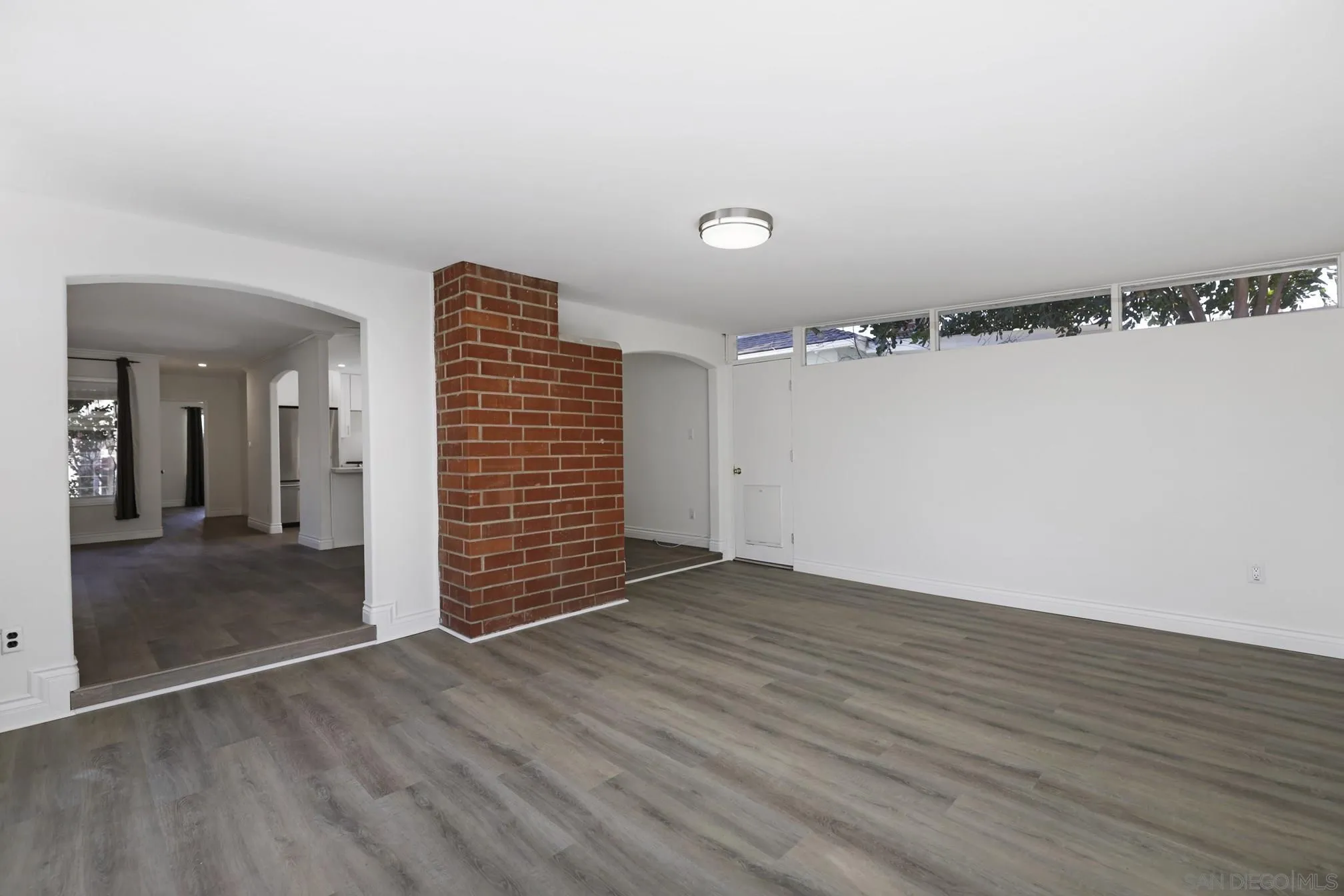 5721-23 Campanile Way San Diego, CA 92115 - Photo 48 of 59 wooden floor in an empty room