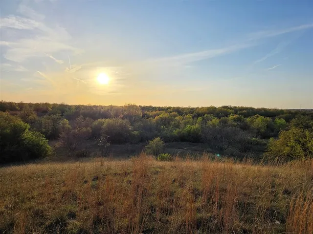 a view of lake with mountain
