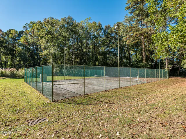 a view of a backyard with a fountain