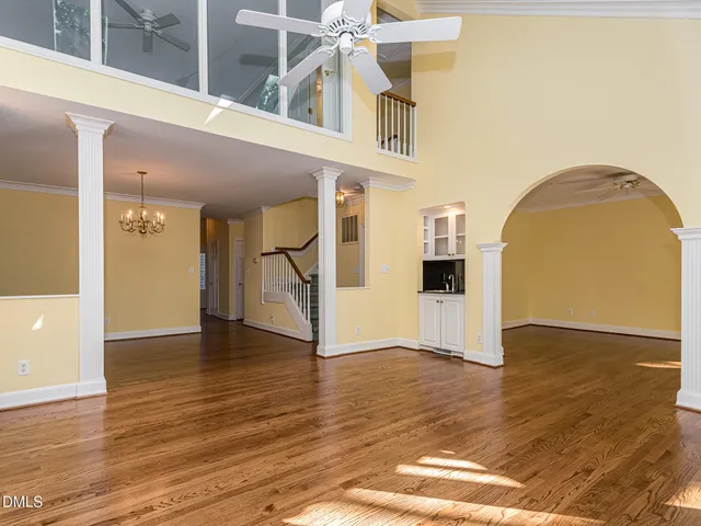 a view of an entryway with wooden floor