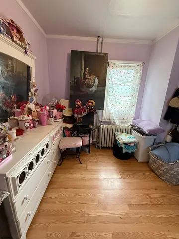 a room with furniture and a flat screen tv