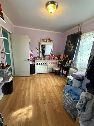 a room with furniture and a flat screen tv